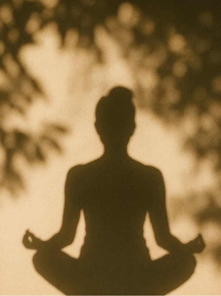 Meditative silhouette suggesting peace and grounding